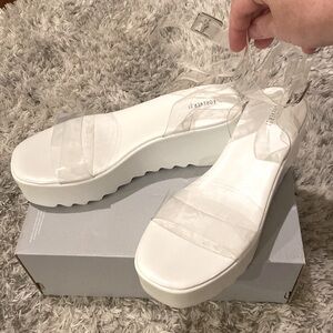 NWOT white wedge sandal with clear straps. Forever 21 women size 8.